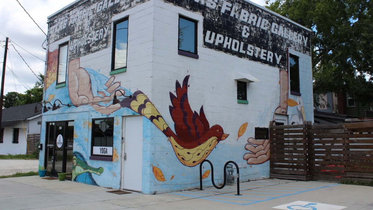 Revolution Yoga Studio This Victorian District mural wraps around three sides of a building.