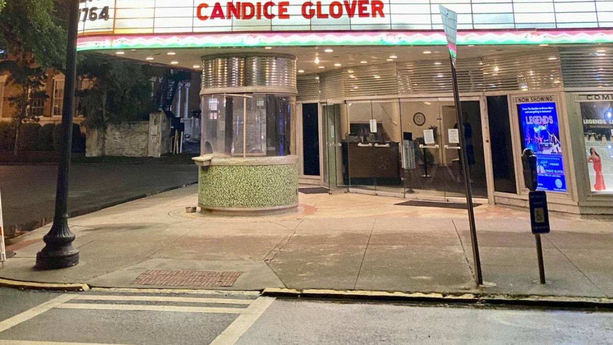 The Historic Savannah Theatre marquee lights up the Savannah skyline.