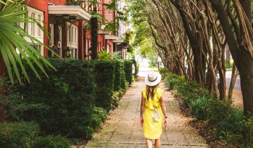 Solo traveler in Savannah. Solo traveler walking the street in Savannah, Georgia.