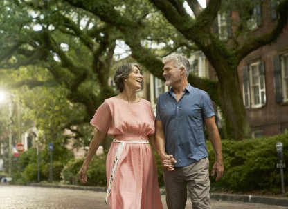 couple walking down jones street