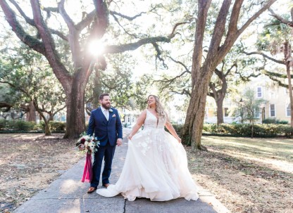 A bride and groom in Lafayette Square in Savannah, Georgia