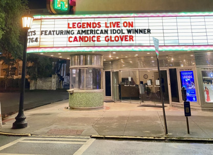 The Historic Savannah Theatre marquee lights up the Savannah skyline.