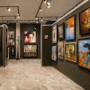 A retail gallery with walls of fine art.