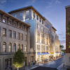 Exterior rendering of Tempo by Hilton Savannah Historic District, showing a modern mid-rise hotel with illuminated windows, street-level storefronts, and pedestrians walking along a city street at dusk.
