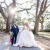 A bride and groom in Lafayette Square in Savannah, Georgia