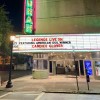 The Historic Savannah Theatre marquee lights up the Savannah skyline.