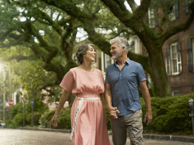 couple walking down jones street