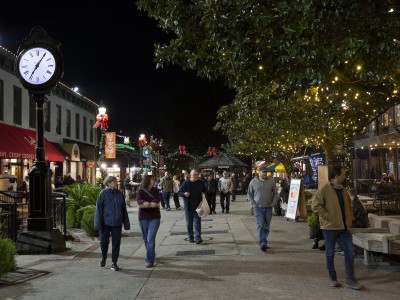 People walking through City Market during the holiday season