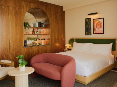 A modern hotel guest room with 60’s inspired decor.