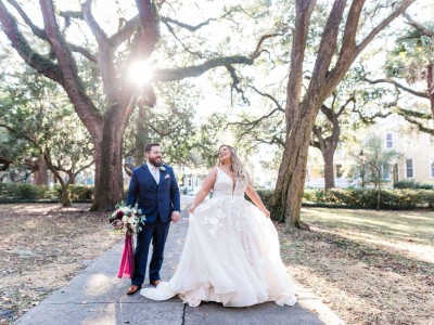 A bride and groom in Lafayette Square in Savannah, Georgia A bride and groom in Lafayette Square in Savannah, Georgia