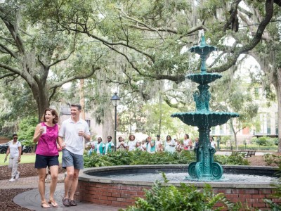 Couple and fountain in square Savannah's Square Fountain