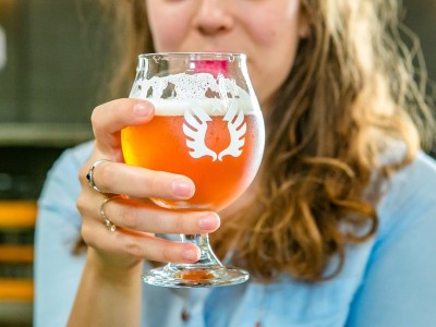 Service-Brewing-woman-drinking-beer.jpg